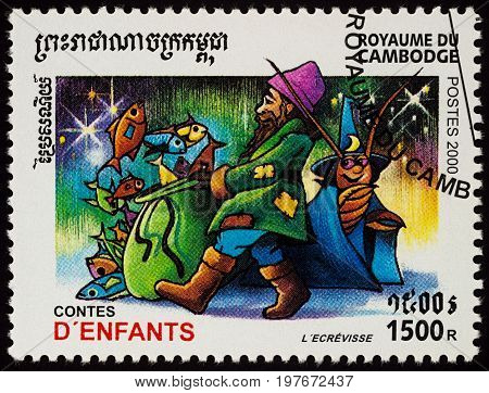 Moscow Russia - July 29 2017: A stamp printed in Cambodia shows scene from a fairy tale "The Crayfish" series "Children's Stories" circa 2000