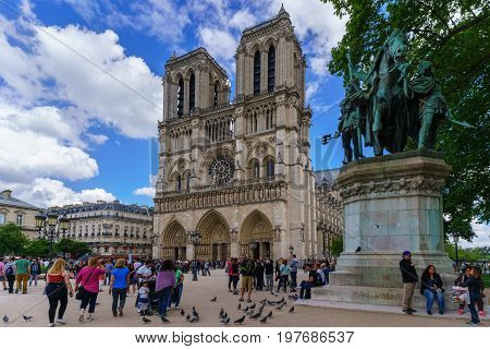 Paris France - May 13 2017 : The famous Cathedral Notre-Dame de Paris French Gothic architecture is one of the most well-known church in the world