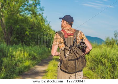 Fishermen Go Fishing With Fishing Rods In Their Hands