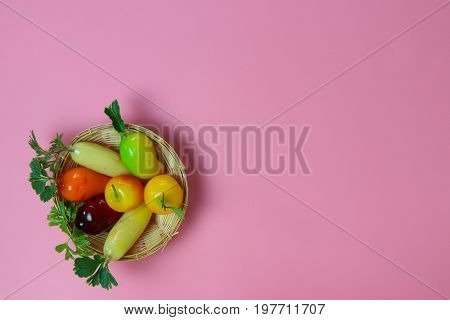 Ball plated thai dessert on pink background, Mold from steamed beans is a fruits shape.