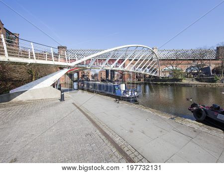 View of Castlefield Basin & the Merchant's Bridge Manchester's industrial heritage heart on a sunny morning