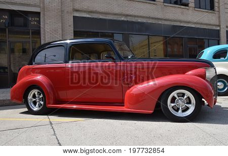 CASSELTON, NORTH DAKOTA, July 27, 2017: The annual Casselton Car Show which occurs the last Thursday of July features classic vehicles such as the  restored 1937 two door Chevy