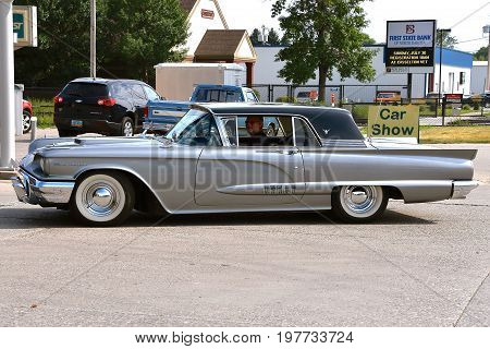 CASSELTON, NORTH DAKOTA, July 27, 2017: The annual Casselton Car Show which occurs the last Thursday of July features classic vehicles such as the  restored  1959 Ford Thunderbird