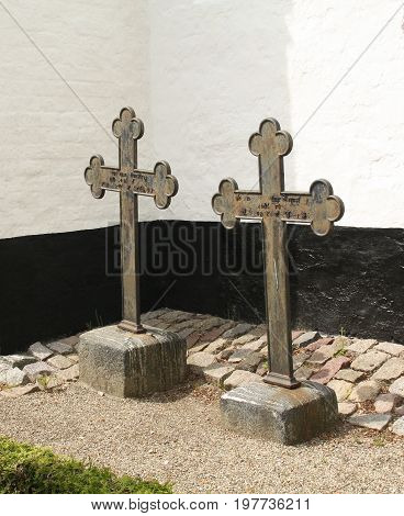 Nykøbing. June-15-2017. Two meta crosses't the Karleby Kirke in Nykøbing on the island Falster.Denmark
