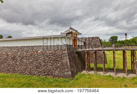YAMAGATA JAPAN - MAY 28 2017: Reconstructed Otebashi Bridge (2005) and Ichimonji Gate (2014) of Main Bailey of Yamagata Castle (founded in 1356). National historical site of Japan since 1986
