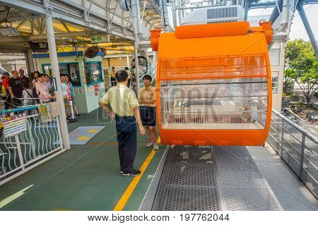OSAKA, JAPAN - JULY 18, 2017: Close up of Tempozan Ferris Wheel in Osaka, Japan. The wheel has a height of 112.5 metres, it's opened in 1997, situated in Tempozan Harbor Village.