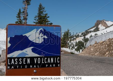 Lassen Volcanic National Park July 1 2017: Lassen Volcanic Scenic Drive sign along the road in early summer