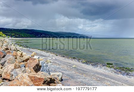 Stormy Sky And Saint Lawrence River Beach In Saint-irenee, Quebec, Canada In Charlevoix Region