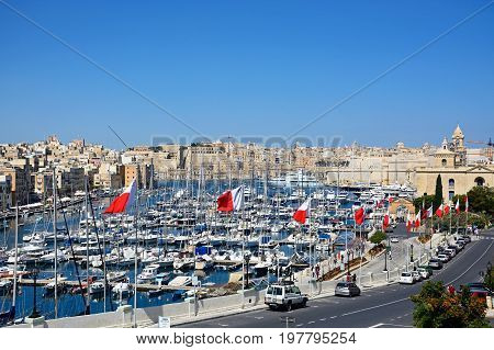 VITTORIOSA, MALTA - MARCH 31, 2017 - Elevated view of Vittoriosa waterfront and marina with views towards Senglea and Valletta Vittoriosa (Birgu) Malta Europe, March 31, 2017.