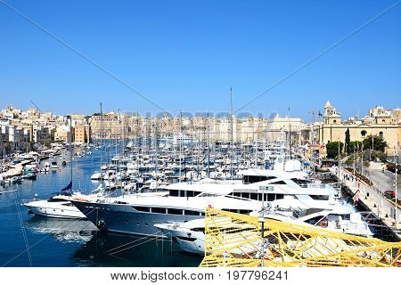 VITTORIOSA, MALTA - MARCH 31, 2017 - Elevated view of Vittoriosa waterfront and marina with views towards Senglea and Valletta Vittoriosa (Birgu) Malta Europe, March 31, 2017.