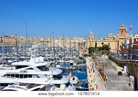 VITTORIOSA, MALTA - MARCH 31, 2017 - Elevated view of Vittoriosa marina and waterfront with views towards Valletta Vittoriosa (Birgu) Malta Europe, March 31, 2017.