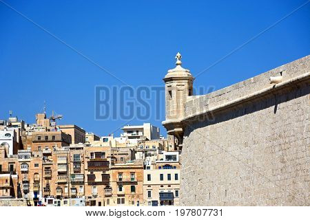 Corner tower on Fort Saint Angelo with views towards Valletta Vittoriosa (Birgu) Malta Europe.