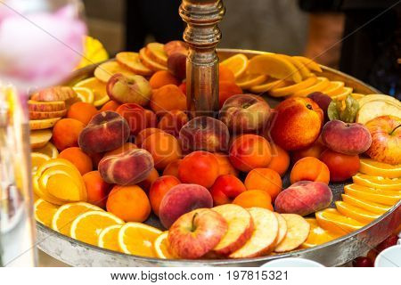 Heap of fresh fruits and vegetables on table close up.