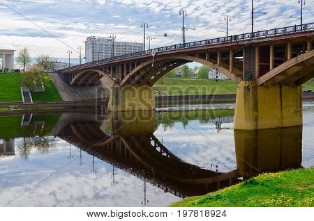 VITEBSK BELARUS - MAY 18 2017: View of Kirovsky bridge across river Zapadnaya Dvina Vitebsk Belarus