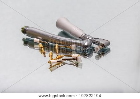 dental and endodontic instruments on the mirror. Top view