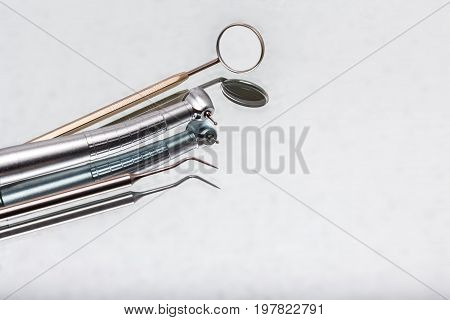 dental and endodontic instruments on the mirror. Top view