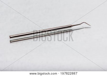 dental and endodontic instruments on the mirror. Top view