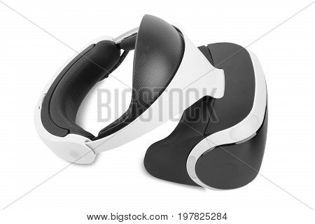 A virtual reality helmet isolated over the white background. Immersion simulator. A new interactive toy for children and adults. Black and white virtual reality headset for professional gamers.
