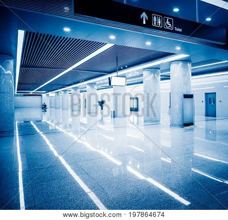 modern building hallway with marbled floor,blue toned,china.