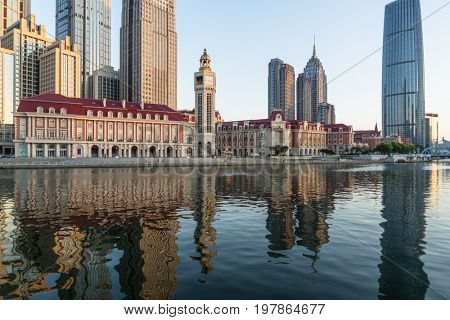 Tianjin city waterfront downtown skyline with Haihe river,China.