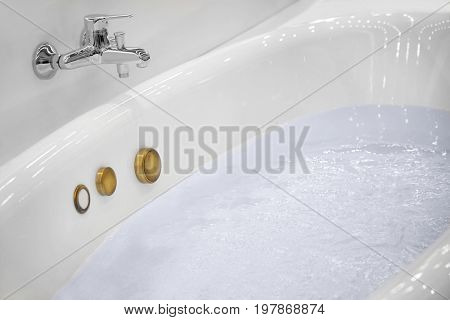 New  bathtub filled with water in store