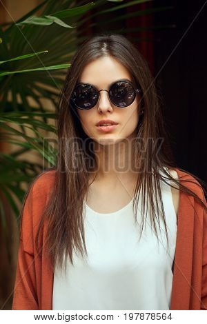 Close Up Portrait Young Girl In White Shirt Jeans And Sunglasses