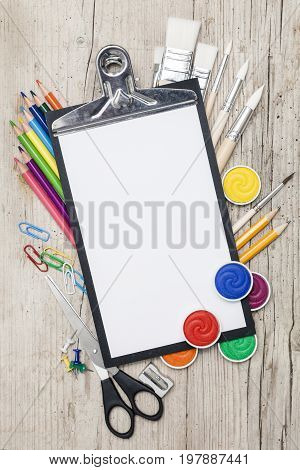School Accessories On A Wooden Background