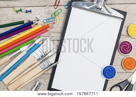 School Accessories On A Wooden Background