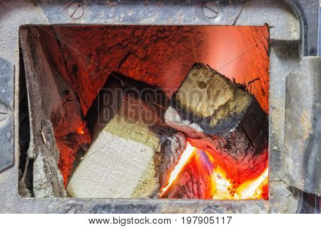Wood Stove Firebox With Fire And Wood 3