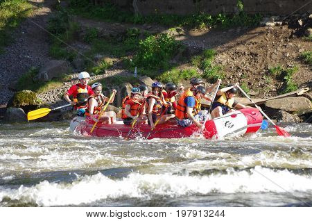 LOSEVO - AUGUST 18: Whitewater rafting on AUGUST 18 2012 RUSSIA. Unidentified persons enjoy whitewater rafting on the Vuoksi river in Losevo Leningrad region Russia