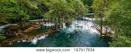 Una River. Waterfall in Martin brod. Bosna and Hercegovina. Beautiful big waterfall on the wild river.