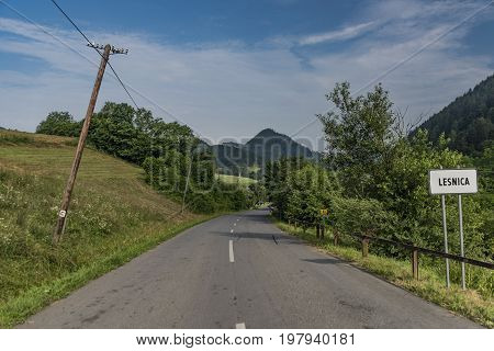 Road near Lesnica village in Pieniny national park in cold summer morning