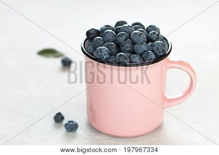 Summer Healthy Snack Blueberry In A Cup On The Table.