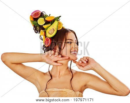 Hair and facial mask from fresh fruits for woman concept. Girl care her skin homemade by dint of organic therapy on isolated. Woman in profile is testing new diet. Opening of a new spa salon.