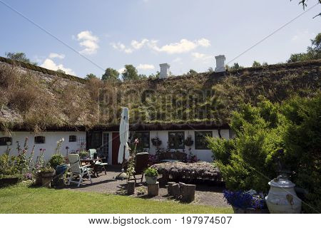 LAESOE DENMARK - JULY 28 2017: Seaweed roof house called Trollebo Laesoe 2017