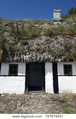 LAESOE DENMARK - JULY 26 2017: Seaweed roof farm museum called Heather Farm Laesoe 2017