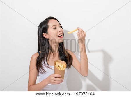 Woman enjoy french fries
