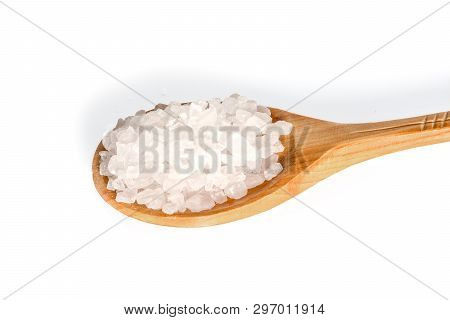 Pure Natural Rock Salt. Large Salt Crystals In A Bamboo Spoon. Close Up Isolated On White Background