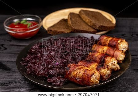 Fried Homemade Grilled Sausages Or Chevapchichi With Stewed Sauerkraut, And Slices Of Rye Bread And 