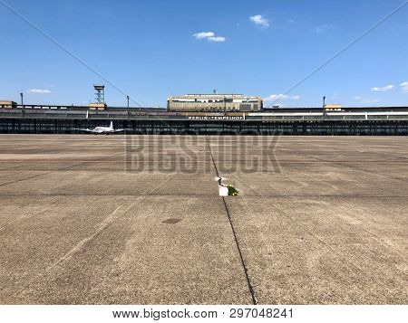BERLIN, GERMANY - APRIL 18, 2019: The terminal building at Templehof Airport, which closed all operations on 30 October 2008, and is now a recreation space close to the centre of Berlin, Germany.