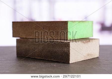 Group Of Two Whole Work Item Grey And Green Abrasive Block Sponges In The Office