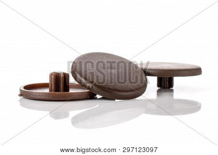 Group Of Three Whole Brown Plast Caps Work Item Isolated On White Background