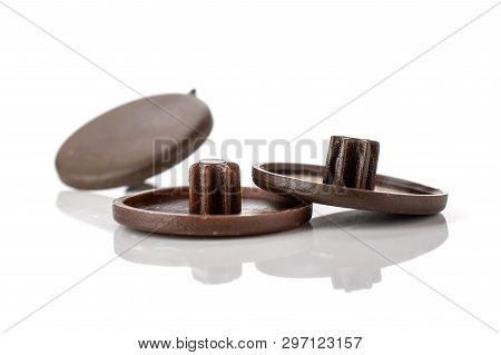 Group Of Three Whole Dark Brown Plast Plugs Work Item Isolated On White Background