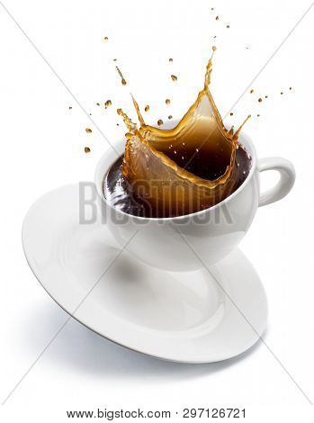 Splash of coffee in a form of crown in a white coffee cup. File contains clipping path.