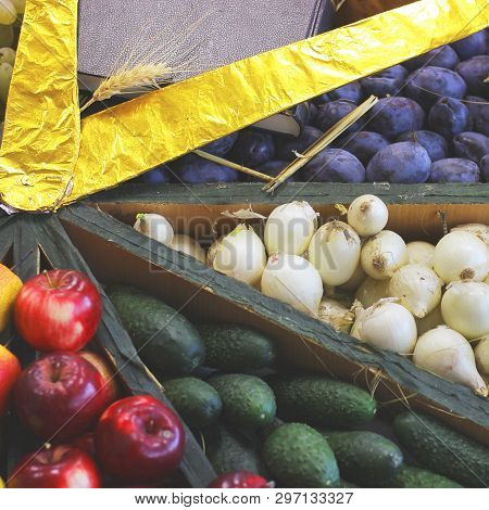 Harvest. Plums, Onions, Cucumbers And Apples. Background. Close Up. Food