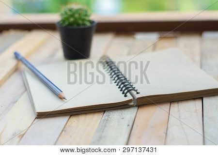 Man Business Inspection Notepad With Pencil On Wood Board Background.using Wallpaper For Education, 