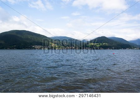 A View Of Lake Tegernsee In Germany On A Cloudy Summer Day