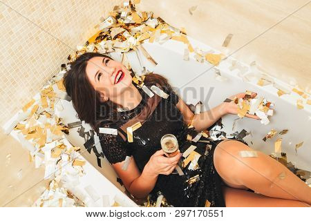 Luxe Fashion Style Party. Spoilt Girl Enjoying Her Special Day With Glass Of Champagne In Bathtub, L