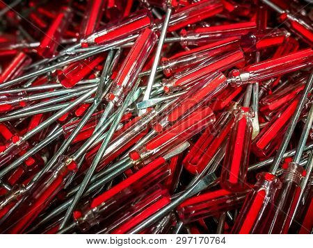 Screwdrivers. Manual  Tool For Screwing And Unscrewing Screws. A Typical Simple Screwdriver Has A Ha