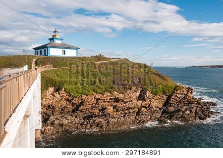 Pancha Island Lighthouse In Ribadeo Coastline, Galicia, Spain.